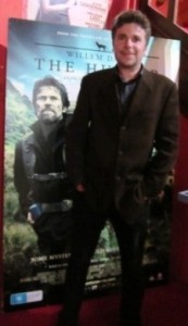 How does a first time film director lure a Hollywood heavyweight into his movie? (Willem Defoe in The Hunter)